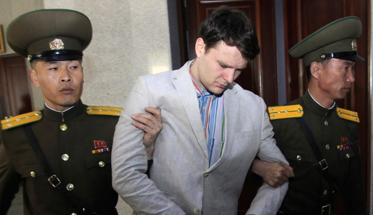 In this March 16, 2016, file photo, American student Otto Warmbier, center, is escorted at the Supreme Court in Pyongyang, North Korea.