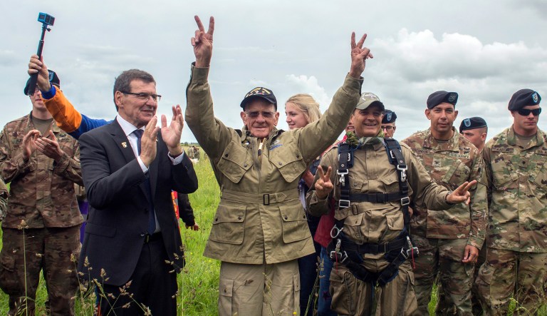 U.S. World War II D-Day veteran Tom Rice, from Coronado, CA, after parachuting in a tandem jump into a field in Carentan, Normandy, France, Wednesday, June 5, 2019.