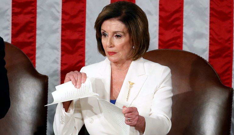Nancy Pelosi tears her copy of then-President Donald Trump's State of the Union address after he delivered it to a joint session of Congress on Capitol Hill in Washington, Tuesday, Feb. 4, 2020.