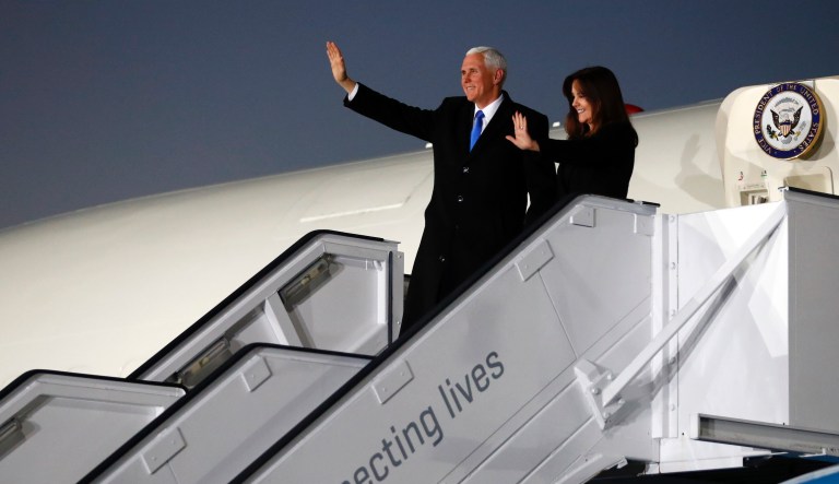 United States Vice President Mike Pence and his wife Karen leave their airplane upon landing at the Munich airport, in Munich, Germany, Friday, Feb. 15, 2019. Pence arrived Thursday to attend the Munich Security Conference.