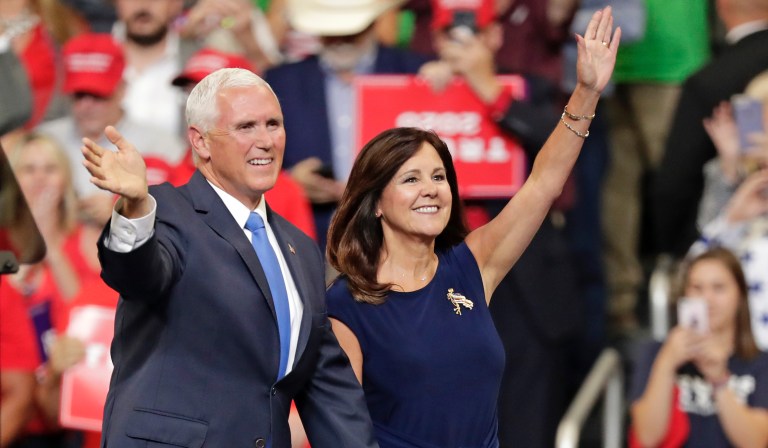 Vice President Mike Pence, left, and wife Karen Pence greet supporters at a rally where President Donald Trump formally announced his 2020 re-election bid Tuesday, June 18, 2019, in Orlando, Fla. 