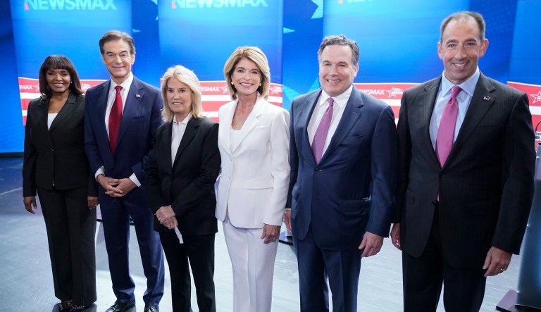 Kathy Barnette, Mehmet Oz, moderator Greta Van Susteren, Carla Sands, David McCormick, and Jeff Bartos, (left to right) pose for a photo before they take part in a debate for Pennsylvania U.S. Senate Republican candidates on May 4, 2022, in Grove City, Pennsylvania.