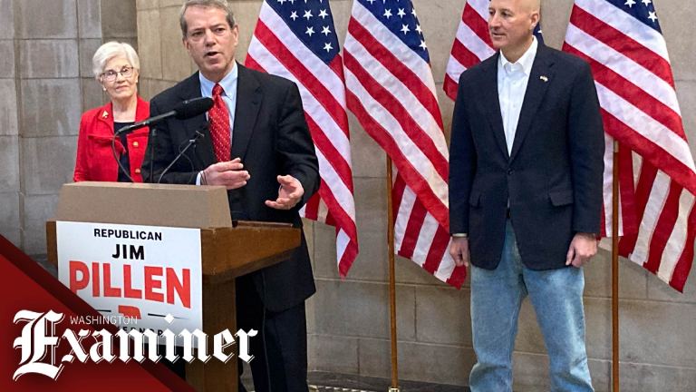 Jim Pillen wins Republican nomination in Nebraska gubernatorial primary, pictured on campaign trail 