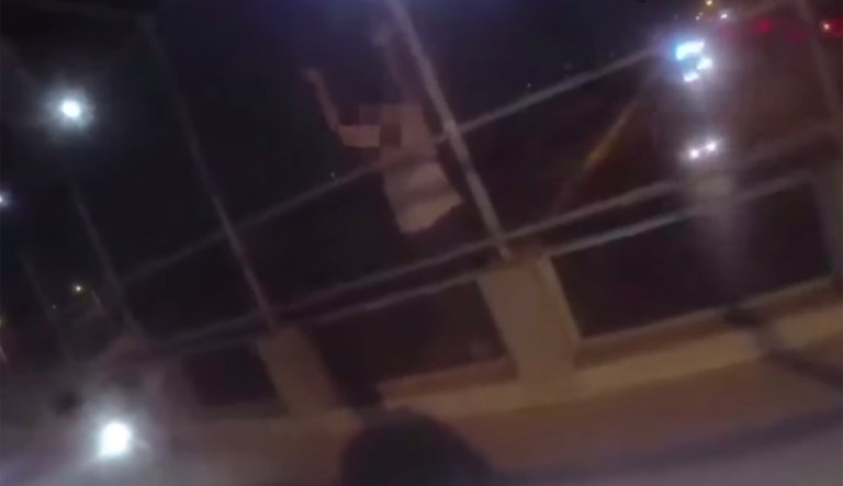 WATCH: Police officer helps stop suicidal man from jumping off a bridge by offering him a hug