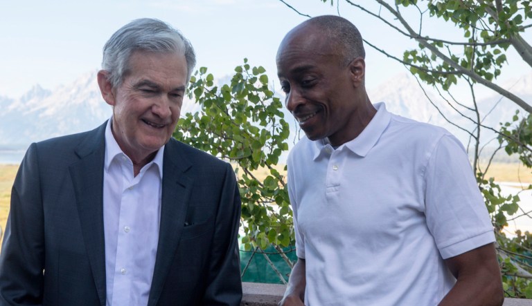 Federal Reserve Chairman Jerome Powell, left, chats with economist Philip Jefferson outside of Jackson Lake Lodge during the Jackson Hole Economic Symposium near Moran in Grand Teton National Park, Wyoming, Friday, Aug. 25, 2023.