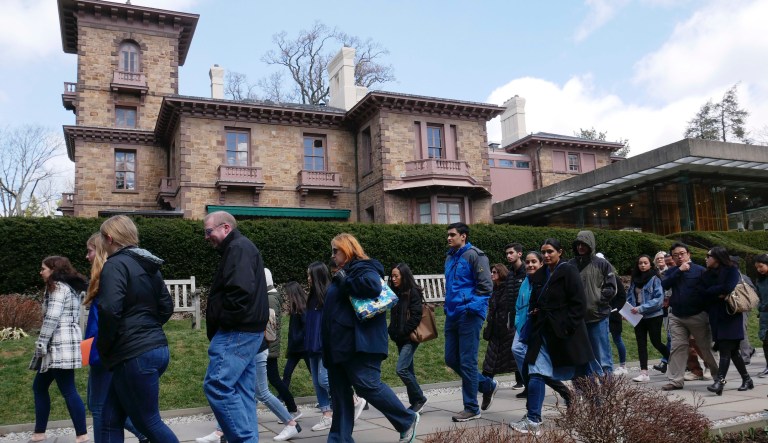 A group takes a tour of the Princeton University campus in Princeton, N.J., Thursday, April 5, 2018.