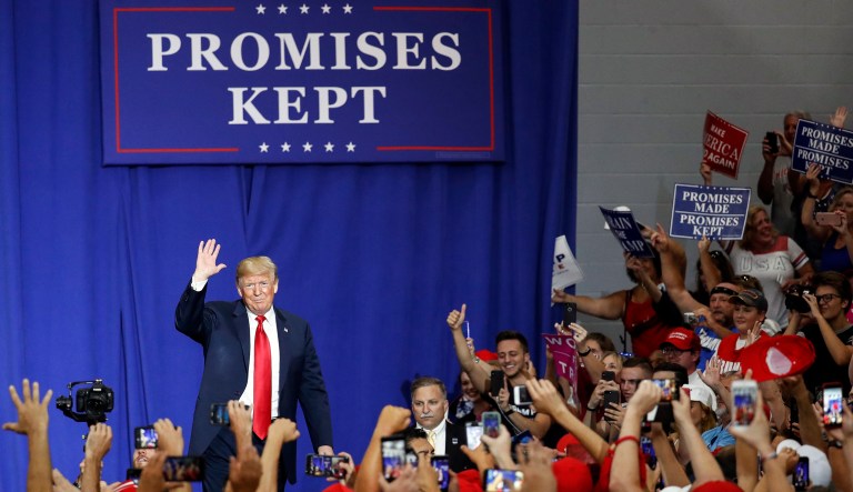President Donald Trump greets the crowd during a rally, Saturday, Aug. 4, 2018, in Lewis Center, Ohio.