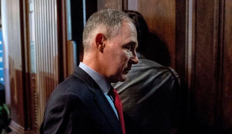 Environmental Protection Agency Administrator Scott Pruitt departs following a news conference at the Environmental Protection Agency in Washington, Tuesday, April 3, 2018, on his decision to scrap Obama administration fuel standards.