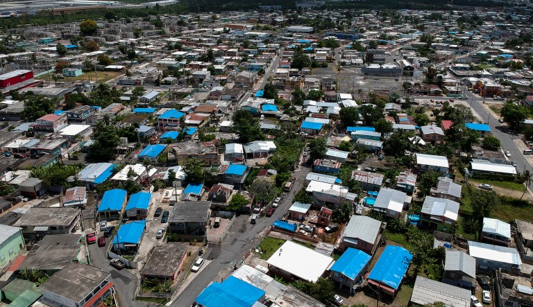 This June 18, 2018, file photo shows an aerial view of the Amelia neighborhood in the municipality of Catano, east of San Juan, Puerto Rico.