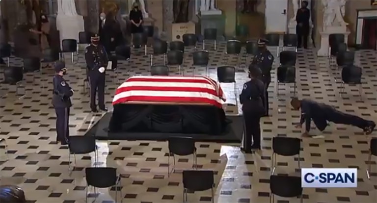 Ruth Bader Ginsburg’s personal trainer does pushups in front of casket as late justice lies in state