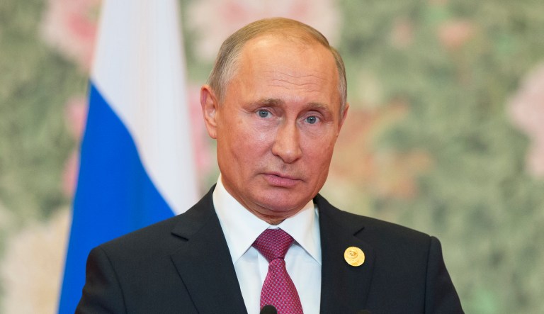 Russian President Vladimir Putin speaks during his news conference after the Shanghai Cooperation Organization (SCO) Summit in Qingdao in eastern China's Shandong Province, Sunday, June 10, 2018. Putin says counter-terrorism efforts are a priority for a regional grouping led by Moscow and Beijing. Putin said a new agreement approved by the SCO spells out plans for joint-anti-terror efforts for the next three years. The SCO includes China, Russia, four ex-Soviet Central Asian nations, India and Pakistan.