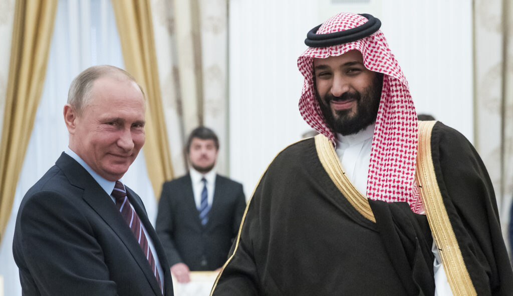 Russian President Vladimir Putin, left, shakes hands with Saudi Deputy Crown Prince and Defense Minister Mohammed bin Salman in Moscow's Kremlin, Russia, Tuesday, May 30, 2017.