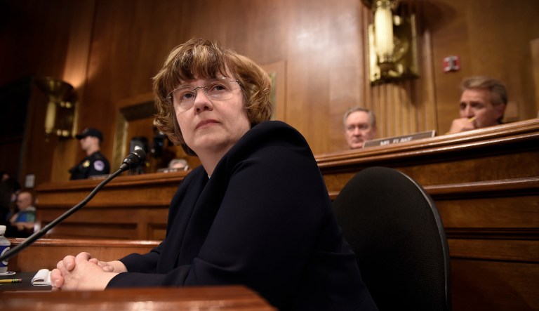 FILE - In this Thursday, Sept. 27, 2018 photo, Rachel Mitchell, a prosecutor from Arizona, waits for Christine Blasey Ford, the woman accusing Supreme Court nominee Brett Kavanaugh of sexually assaulting her, to testify before the U.S. Senate Judiciary Committee on Capitol Hill in Washington. On Friday, Sept. 28, 2018, The Associated Press has found that stories circulating on the internet that Mitchell helped help exonerate a Catholic priest facing sex crimes charges, are untrue.