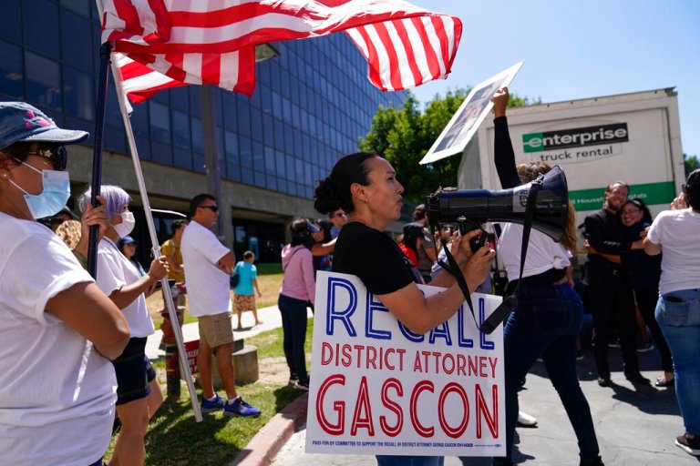 Supporters of a campaign to recall Los Angeles County District Attorney George Gascon gather.