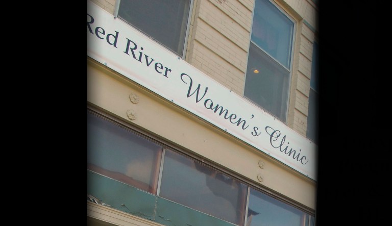 A sign indicating the location of Red River Women's Clinic is seen in Fargo, North Dakota.