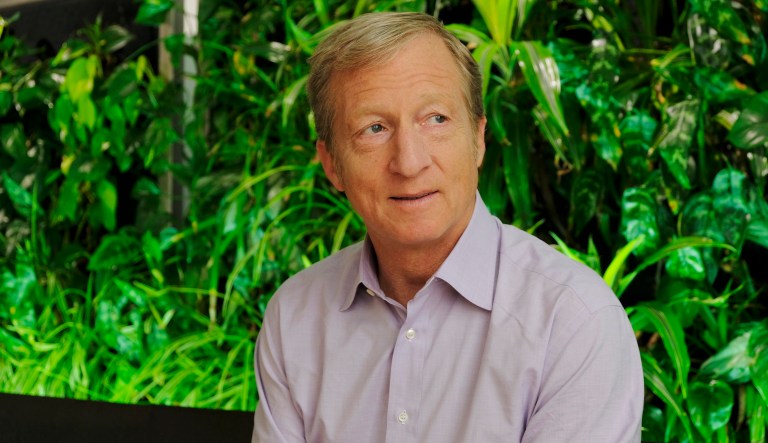 In this photo taken Wednesday, June 27, 2018, environmental activist and billionaire Tom Steyer poses at his offices in San Francisco.