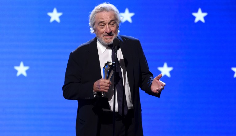 Robert De Niro accepts the best acting ensemble award for "The Irishman" at the 25th annual Critics' Choice Awards on Sunday, Jan. 12, 2020, at the Barker Hangar in Santa Monica, Calif. 