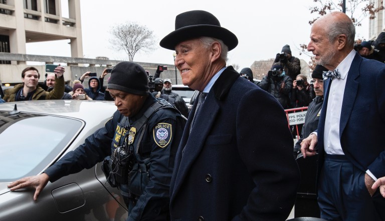 Roger Stone, center, departs federal court in Washington, Thursday, Feb. 20, 2020. President Donald Trump loyalist and ally, Roger Stone was sentenced to over three years in federal prison, following an extraordinary move by Attorney General William Barr to back off his Justice Department's original sentencing recommendation. The sentence came amid President Donald Trump's unrelenting defense of his longtime confidant that led to a mini-revolt inside the Justice Department and allegations the president interfered in the case.