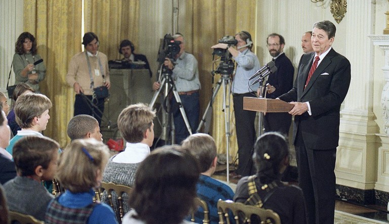 President Ronald Reagan talks to a group of local Washington school students in the State Dining Room of the White House on Monday, Nov. 14, 1988 in Washington. Reagan told the students that the United States inevitable will have a woman president but added that he thought a woman would likely get into the office only by serving first as vice president.