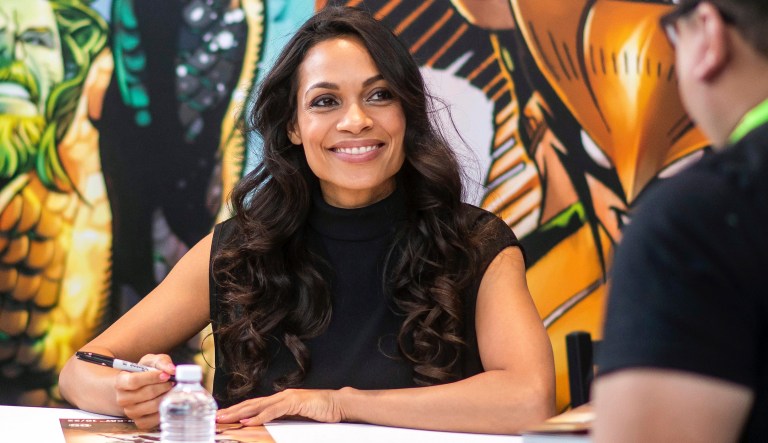 Rosario Dawson signs autographs during New York Comic Con at the Jacob K. Javits Convention Center on Friday, Oct. 4, 2019, in New York. 