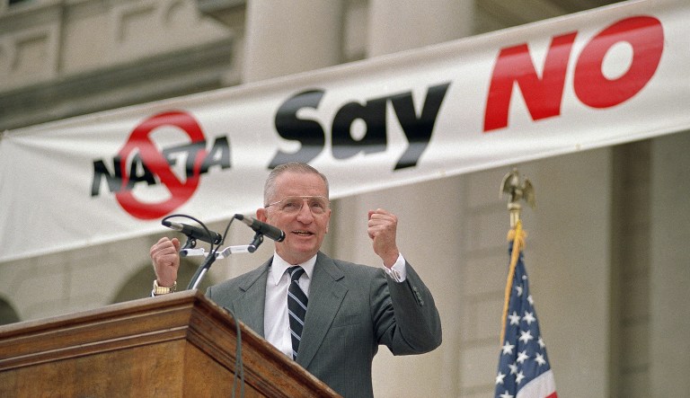 Independent Ross Perot addresses thousands of people at the No To This NAFTA rally on Saturday, Sept. 18, 1993 on the steps of the state Capitol in Lansing, Michigan.