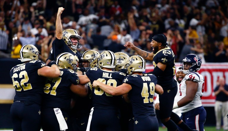 New Orleans Saints kicker Wil Lutz celebrates his game winning 58-yard field goal at the end of regulation in the second half of an NFL football game against the Houston Texans in New Orleans, Monday, Sept. 9, 2019. The Saints won 30-28.