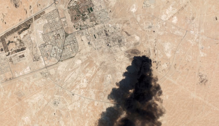 This Saturday, Sept. 14, 2019, satellite image from Planet Labs Inc. shows thick black smoke rising from Saudi Aramco's Abqaiq oil processing facility in Buqyaq, Saudi Arabia.