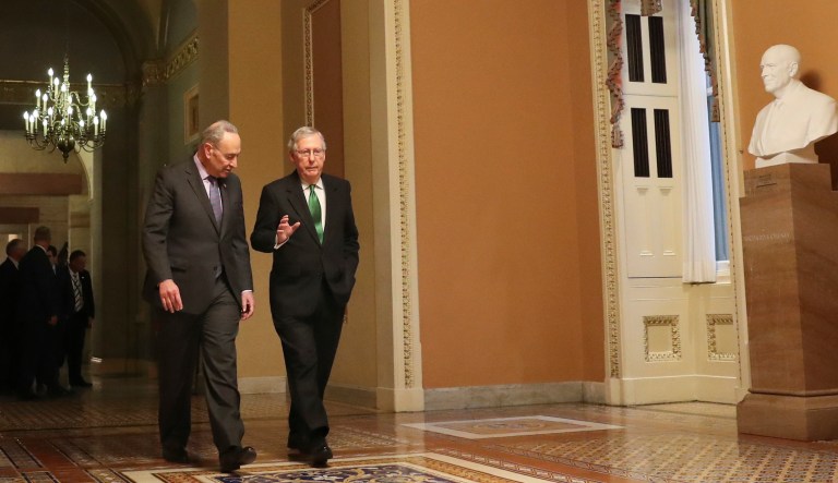 Senate Majority Leader Mitch McConnell, R-Ky., and Senate Minority Leader Chuck Schumer, D-N.Y., left, walk to the chamber after collaborating on an agreement in the Senate on a two-year, almost $400 billion budget deal that would provide Pentagon and domestic programs with huge spending increases, at the Capitol in Washington, Wednesday, Feb. 7, 2018.