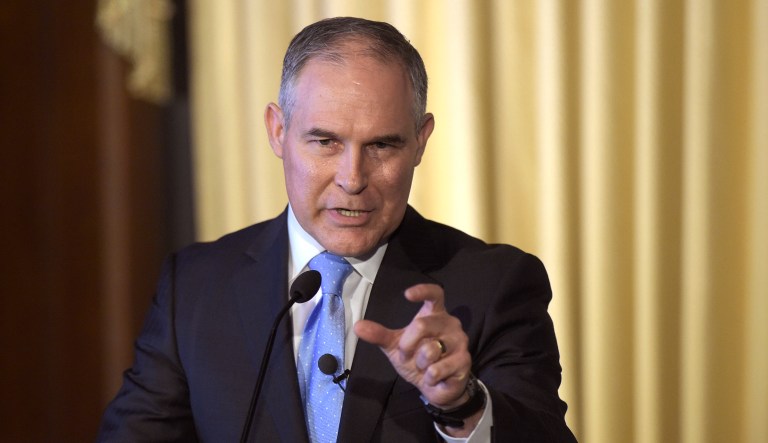 FILE - In this Feb. 21, 2017, file photo, Environmental Protection Agency (EPA) Administrator Scott Pruitt speaks to employees of the EPA in Washington.   Pruittâs schedule shows he met with Dow CEO Andrew Liveris for about a half hour on March 9 during a conference held at a Houston hotel. Twenty days later Pruitt announced his decision to deny a petition to ban Dowâs chlorpyrifos pesticide from being sprayed on food, despite a review by his agencyâs own scientists that concluded ingesting even minuscule amounts of the chemical can interfere with the brain development of fetuses and infants.  EPA released a copy of Pruittâs March meeting schedule earlier this month following several Freedom of Information Act requests. 