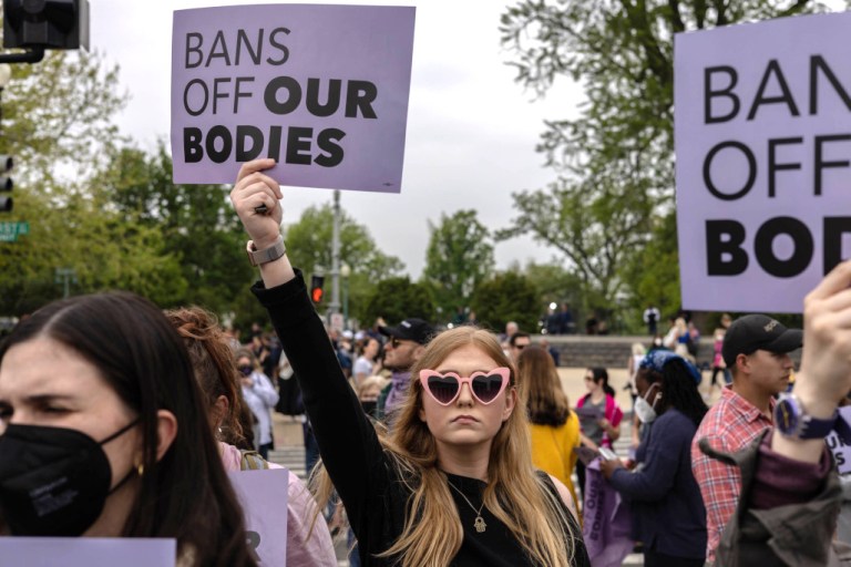 Abortion rights supporters gather in front of the Supreme Court in Washington after a Monday night leak of a draft decision that considered overturning Roe v. Wade.