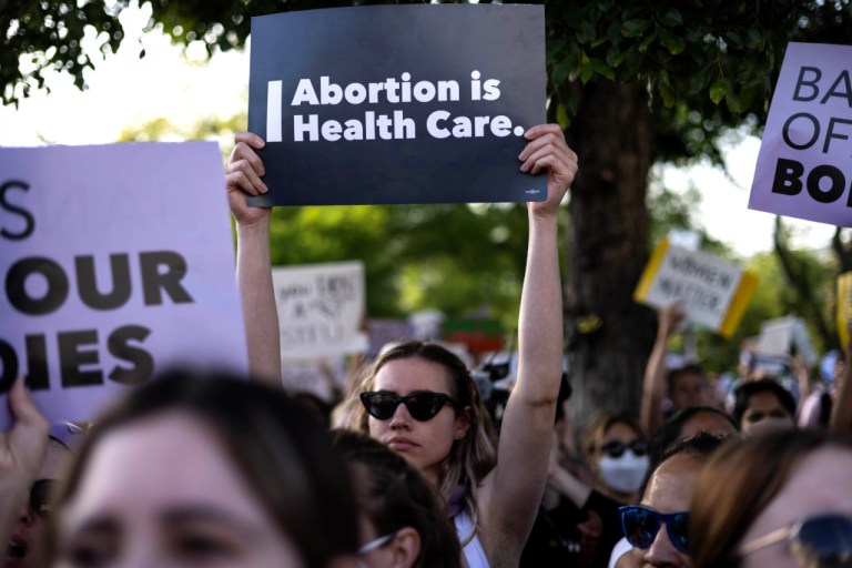 Abortion rights supporters gather in front of the Supreme Court in Washington after a Monday night leak of a draft decision that considered overturning Roe v. Wade.