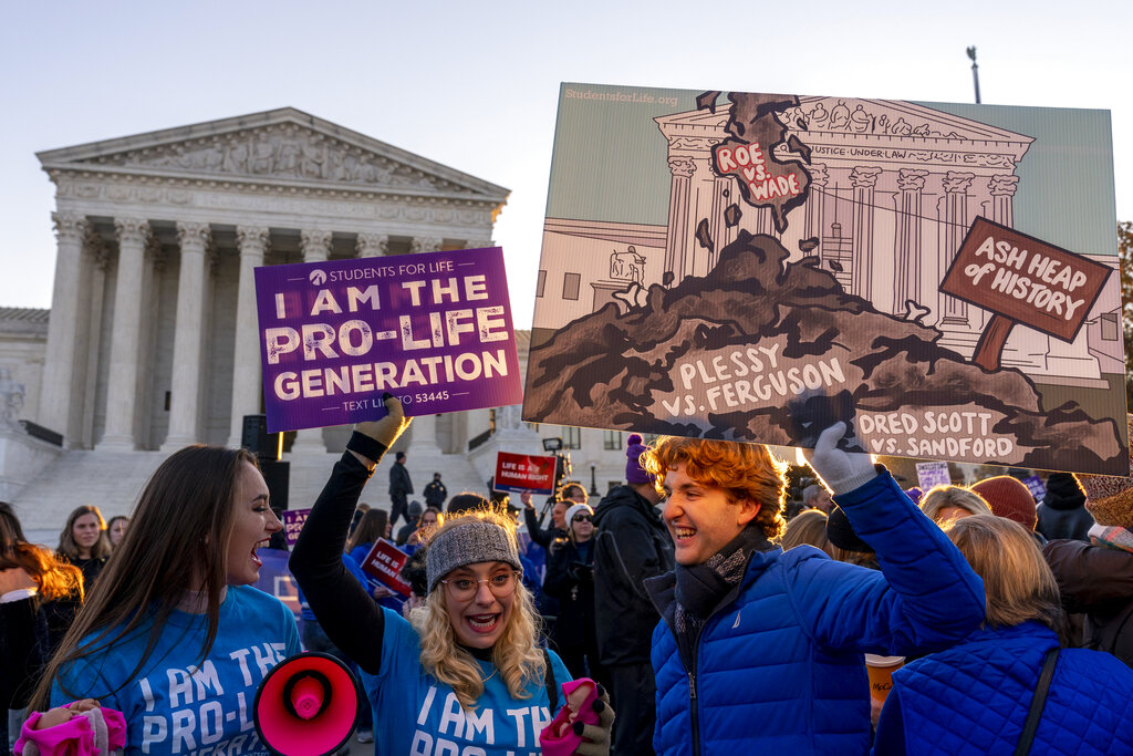 WATCH: Demonstrators sing national anthem outside Supreme Court ahead of Dobbs