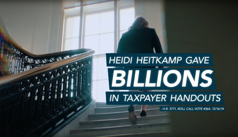 Koch group runs ads attacking Heidi Heitkamp for tax vote