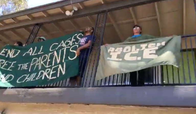 Latino protester shouts down black Trump supporter: ‘Put on some rap music’