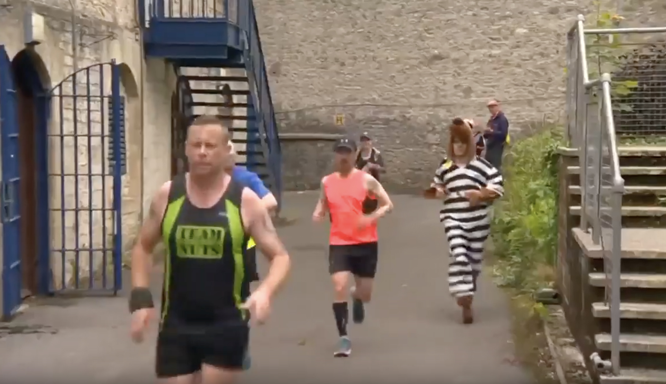 Runners use abandoned prison for marathon