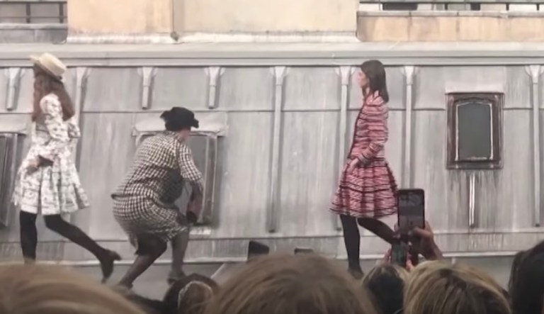 WATCH: Catwalk crasher joins models for Chanel fashion finale