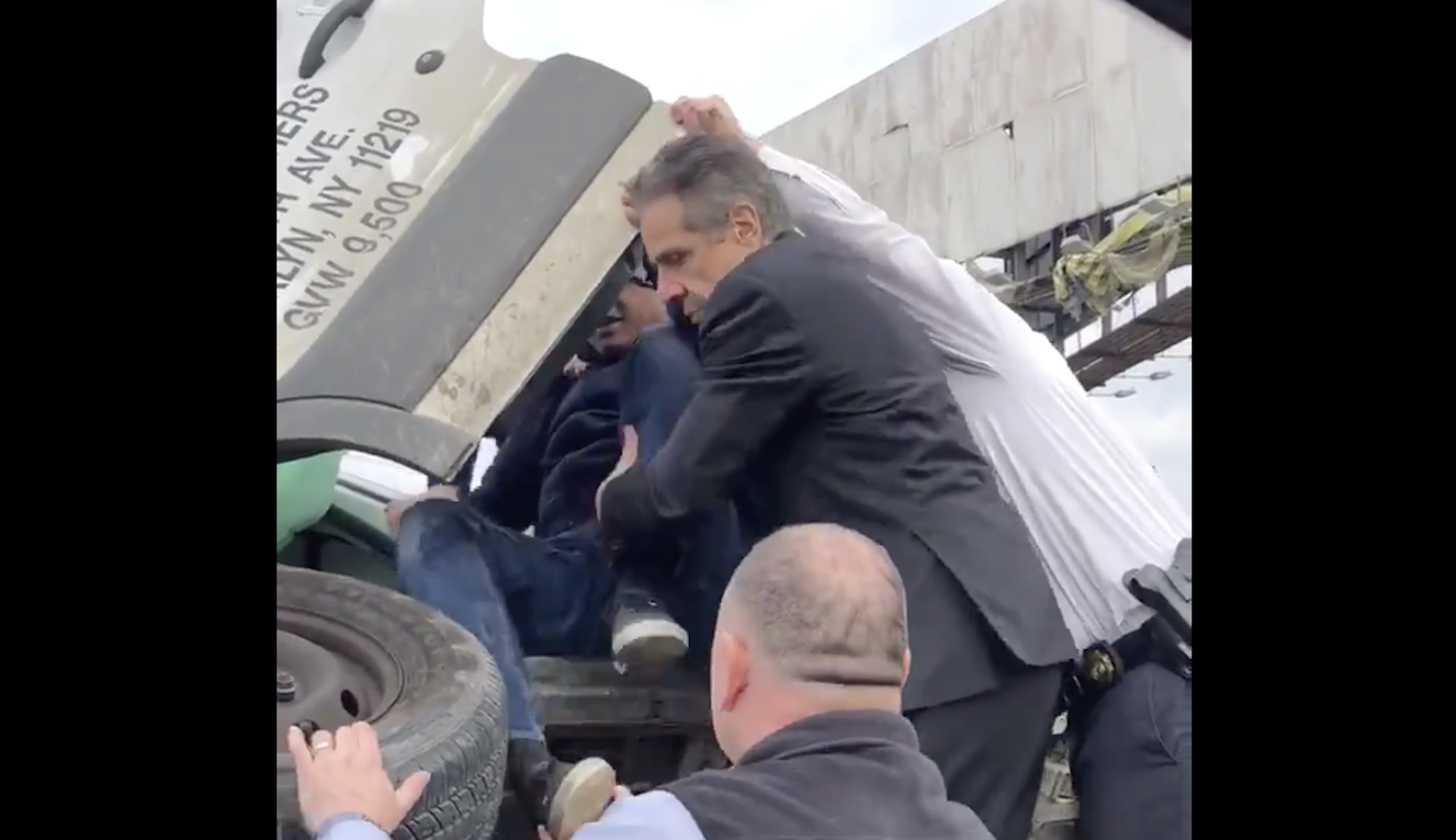 WATCH: Andrew Cuomo helps rescue motorist from overturned vehicle after wreck