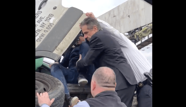 WATCH: Andrew Cuomo helps rescue motorist from overturned vehicle after wreck
