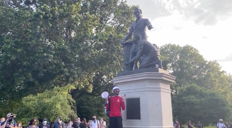 Protester rallies for planned toppling of Emancipation Memorial and urges some to go to McConnell’s home