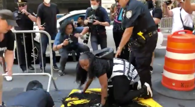 ‘We’re not standing with Black Lives Matter’: Woman charged after defacing mural outside Trump Tower