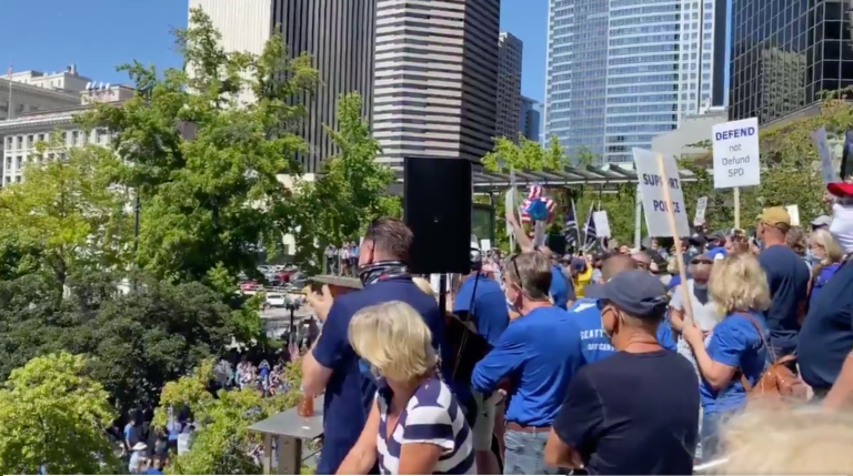 ‘This is the silent majority. They’re silent no more’: Hundreds gather in Seattle to support police department