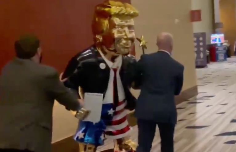 Golden statue of Trump wearing US flag shorts causes stir at CPAC