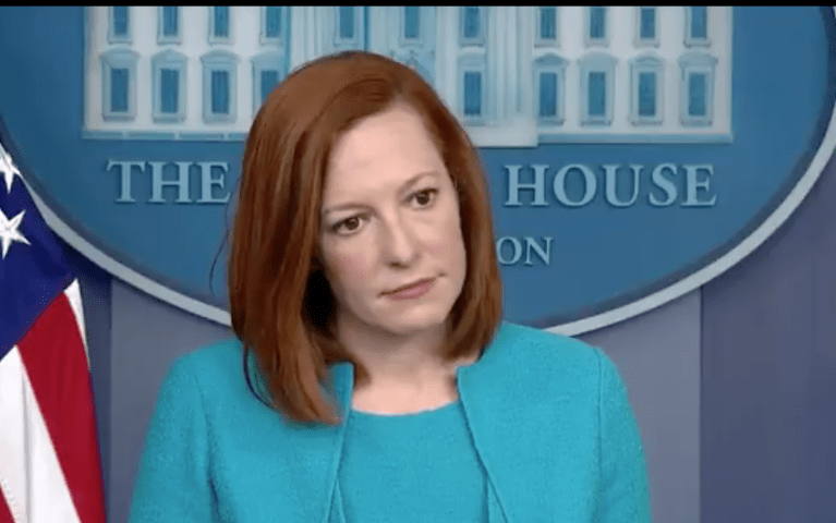 Jen Psaki defends policy of housing migrants in hotel rooms when National Guard was forced to sleep in parking garages