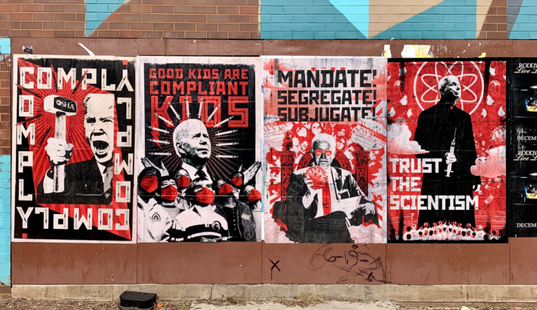 Communist-style art posters mocking Biden and Fauci’s COVID mandates appear in DC