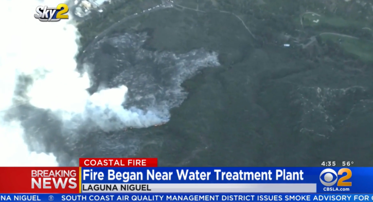 California brush fire engulfs at least 20 homes, forcing hundreds to evacuate