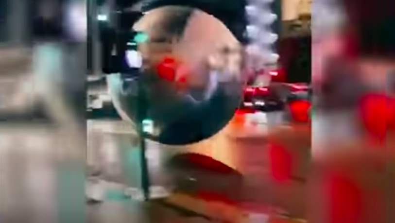 WATCH: Giant Christmas ornaments unleash chaos on London streets