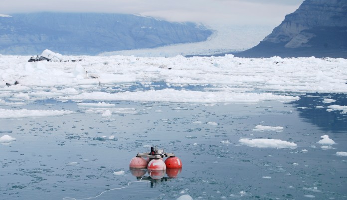 In this photo taken May 14, 2009 and provided by the University of Washington, is the deployment of a hydrophone in Icy Bay, Alaska. Glaciologist Erin Pettit began a research project to find out what calving glacier ice sounded like to a humpback whale. The sound of the ice in the water turned out to be more interesting. Acoustic research in Alaskaâs Icy Bay and other glacier ice-filled waters found that the fizz created by the release of air bubbles under high pressure makes fjords with glacier icebergs the noisiest places in the ocean.
