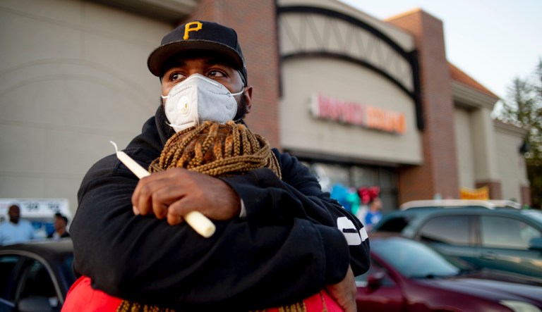 Police investigating whether Michigan security guard killed over mask dispute