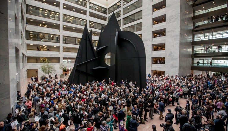 Furloughed government workers affected by the shutdown hold a silent protest against the ongoing partial government shutdown on Capitol Hill in Washington, Wednesday, Jan. 23, 2019.