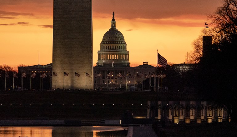 The Capitol and Washington Monument are seen at dawn as the partial government shutdown lurches into a third week with President Donald Trump standing firm in his border wall funding demands, in Washington, Monday, Jan. 7, 2019. After no weekend breakthrough to end a prolonged shutdown, newly empowered House Democrats are planning to step up pressure on Trump and Republican lawmakers to reopen the government.